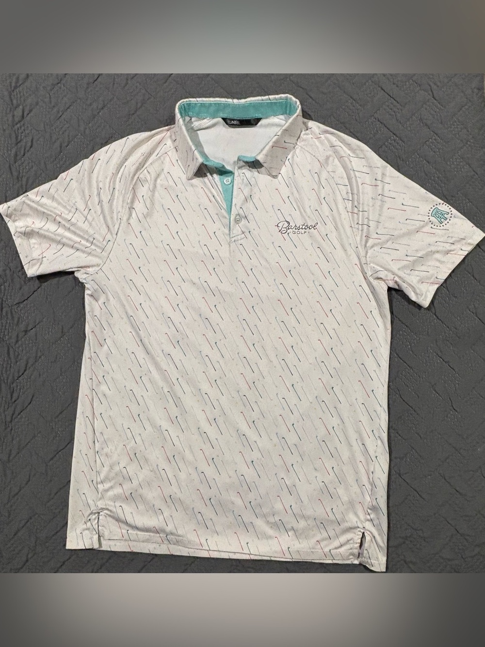 UNRL Barstool Golf Men's White Golf Club Patterned Polo with Teal Trim